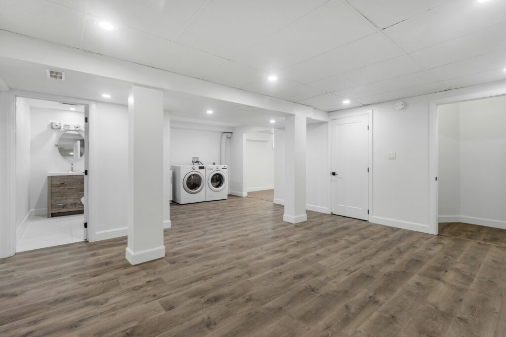 Basement DIY Ideas: Finishing, Flooring & Renovation finished basement laundry room with vinyl flooring