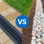 Side-by-side comparison of a channel drain on a paved surface and a French drain made of stones in a yard, showing differences in yard drainage systems.